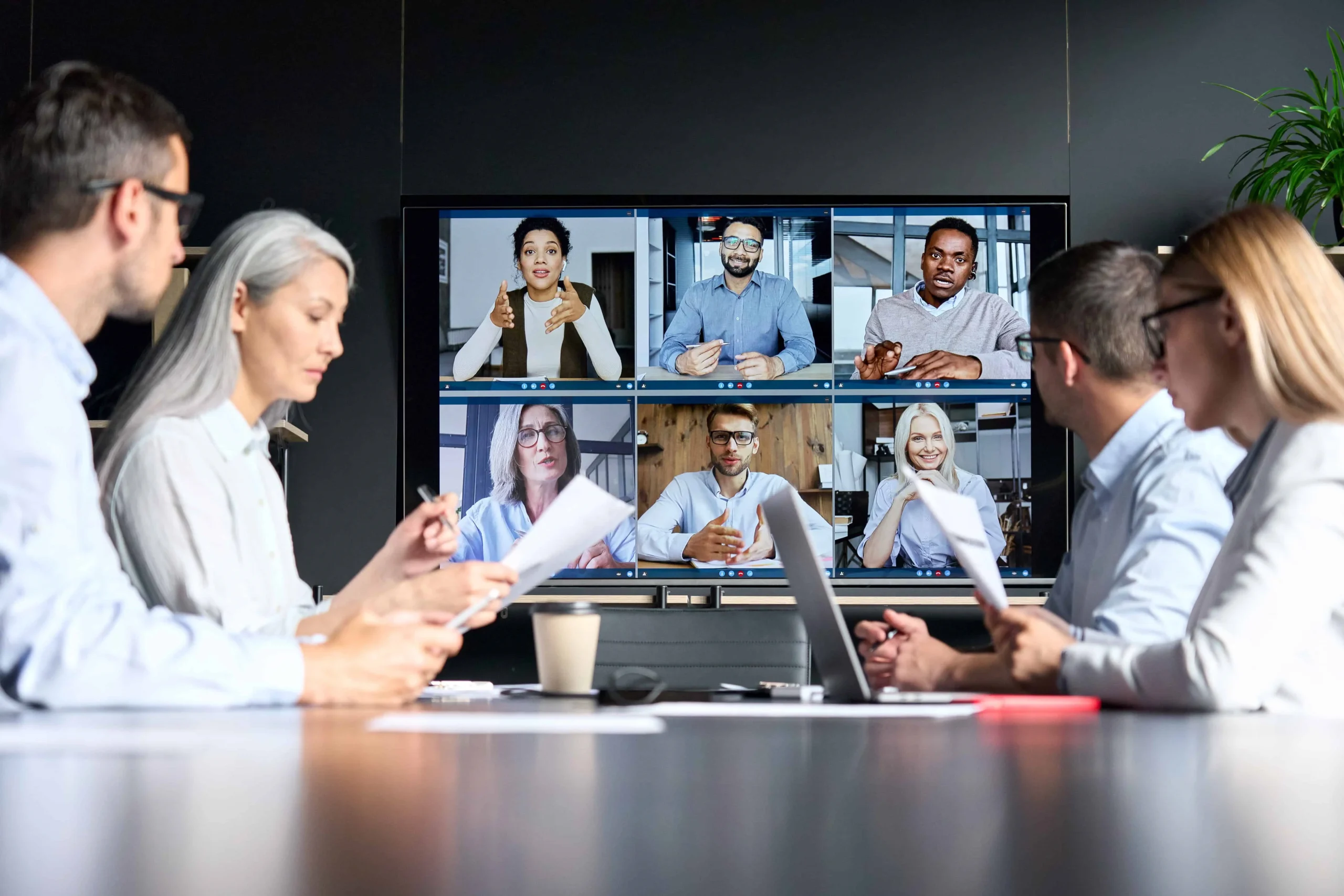 Business team on a video meeting with a smart glasses buyer